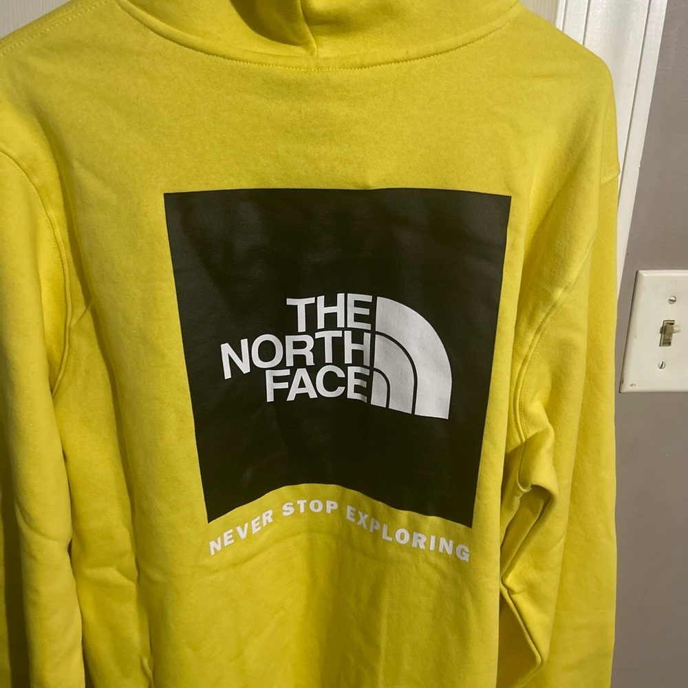 Yellow moth face pull over hoodie. Size large.